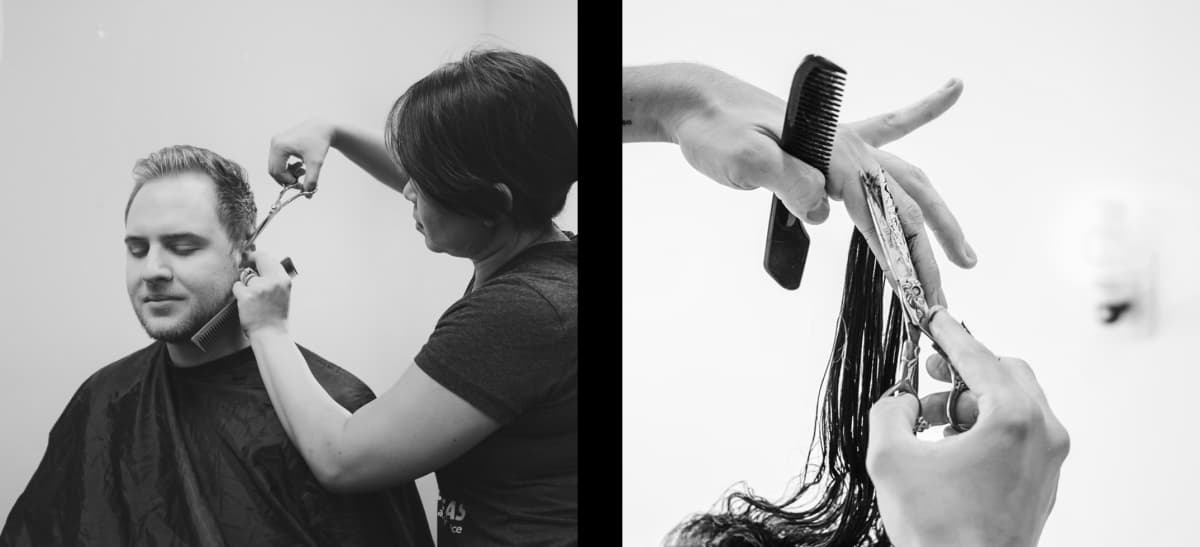Man sitting in a barbers getting his hair cut